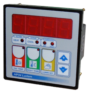 Day and night thermostat with light sensor